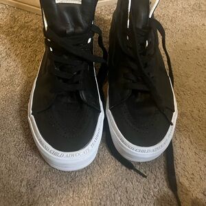 Vans Black and White High-Top Sneakers